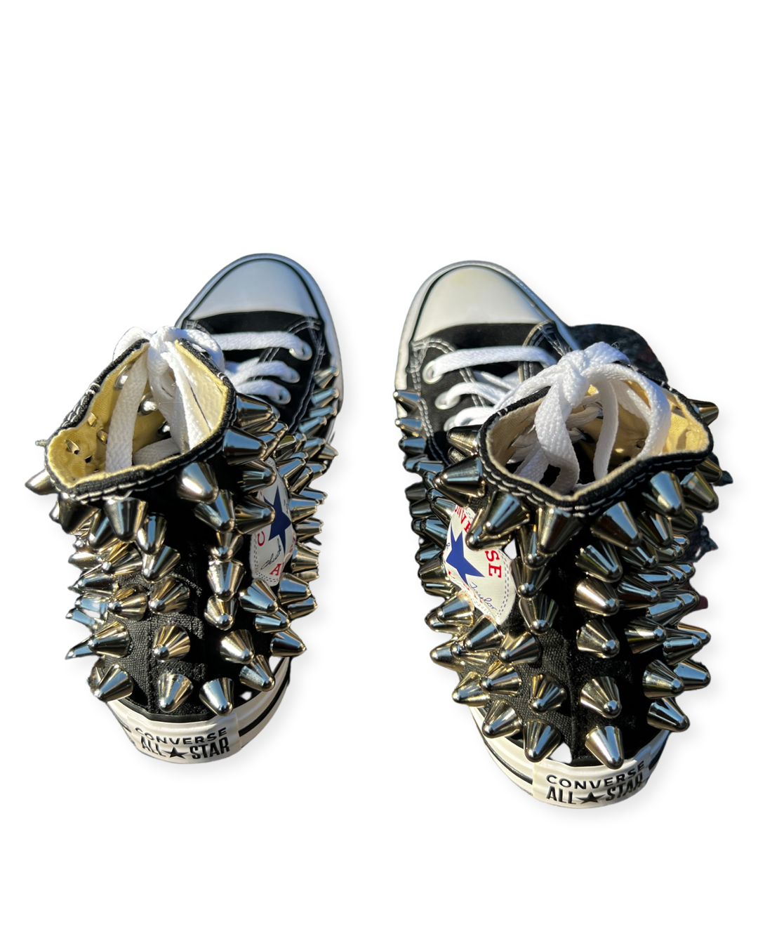 All blue chucks top with the gold spikes